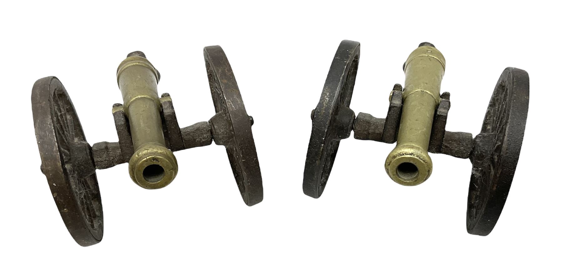 Two cast iron and brass models of cannons