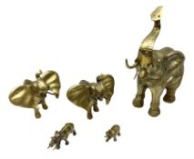 Group of five brass elephants
