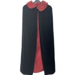 Full length 1930's childs black velvet cape