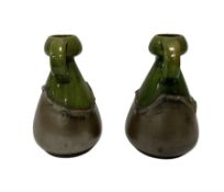 Pair of early 20th century Bretby Arts and Crafts style twin handled vases with green and copper gla