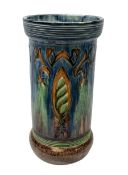 Majolica stick stand of cylindrical form in orange
