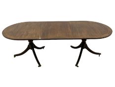 Regency style mahogany twin pedestal dining table
