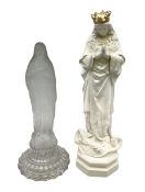 Two Virgin Mary figures