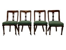 Set of four Victorian mahogany spoon back dining chairs