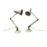 Two white metal angle poise table lamps