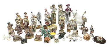 Quantity of composite and ceramic figures to include three Lilliput Lane models of cottages