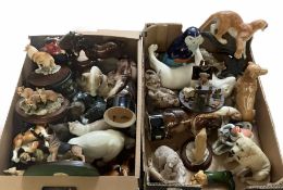 Two boxes of animal figures to include mainly ceramic and composite examples