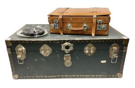 Large travel trunk with studded decoration and hinged lid