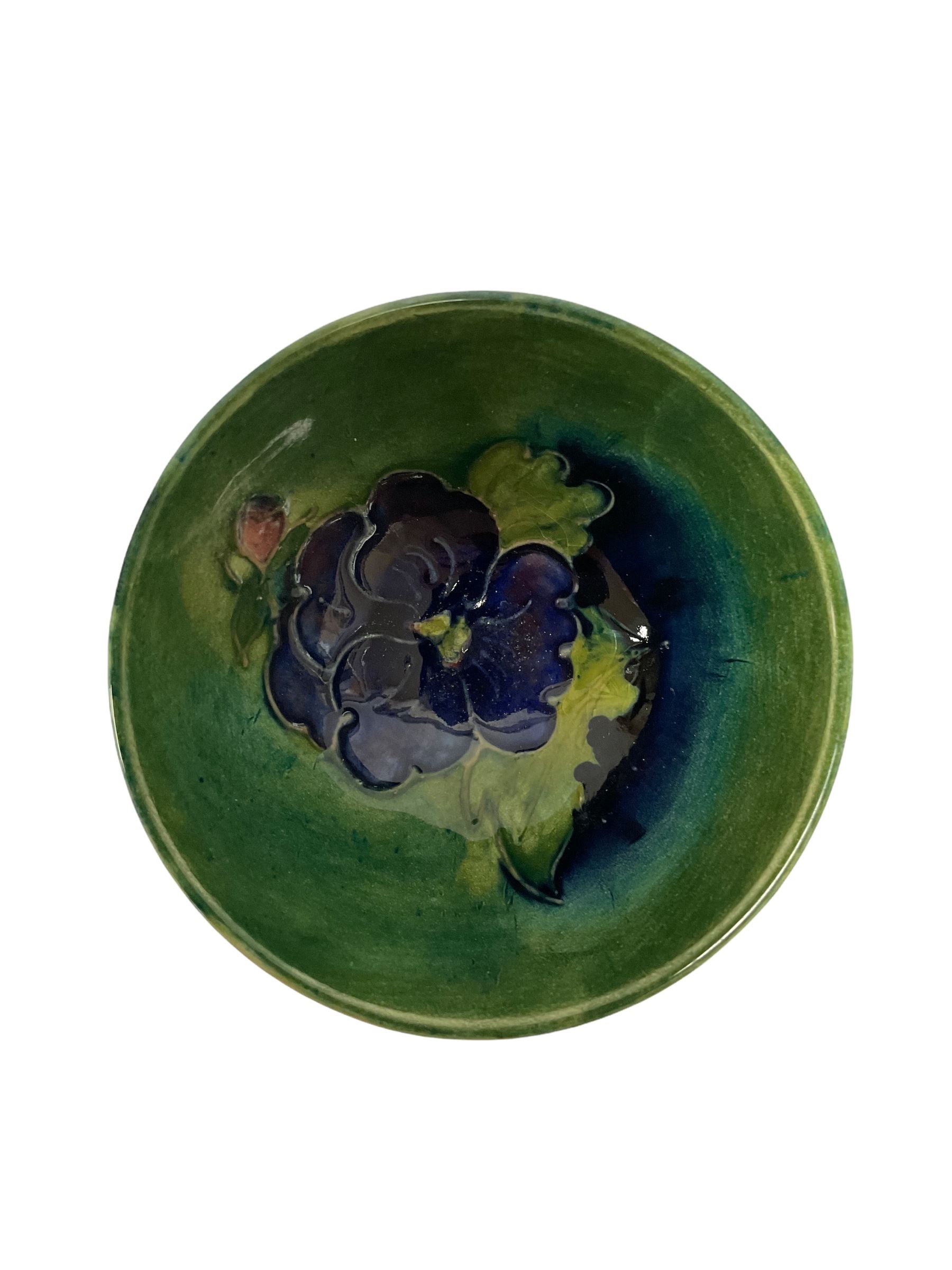 Small Moorcroft bowl decorated with dark blue flowers upon blue green ground - Image 2 of 3