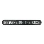 Cast iron sign 'Beware of the Kids'