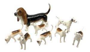 Collection of Beswick figures modelled as dogs comprising Basset Hound model no. 2045