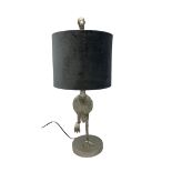 Composite silver effect table lamp