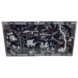 Four Chinese lacquered and mother of pearl inlaid wall panels