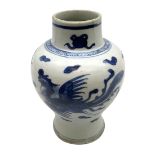 Chinese blue and white vase of baluster form painted with phoenix amongst auspicious clouds