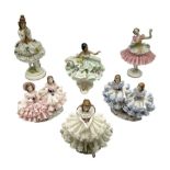 Six Dresden figures and figure groups of lace crinoline ladies