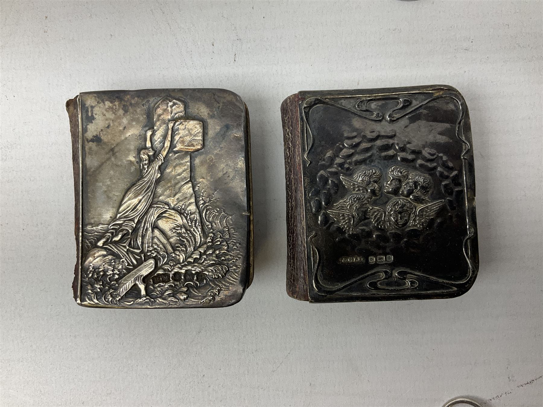 Two hallmarked silver mounted miniature books to include prayer book decorated with winged cherubs s - Image 2 of 8