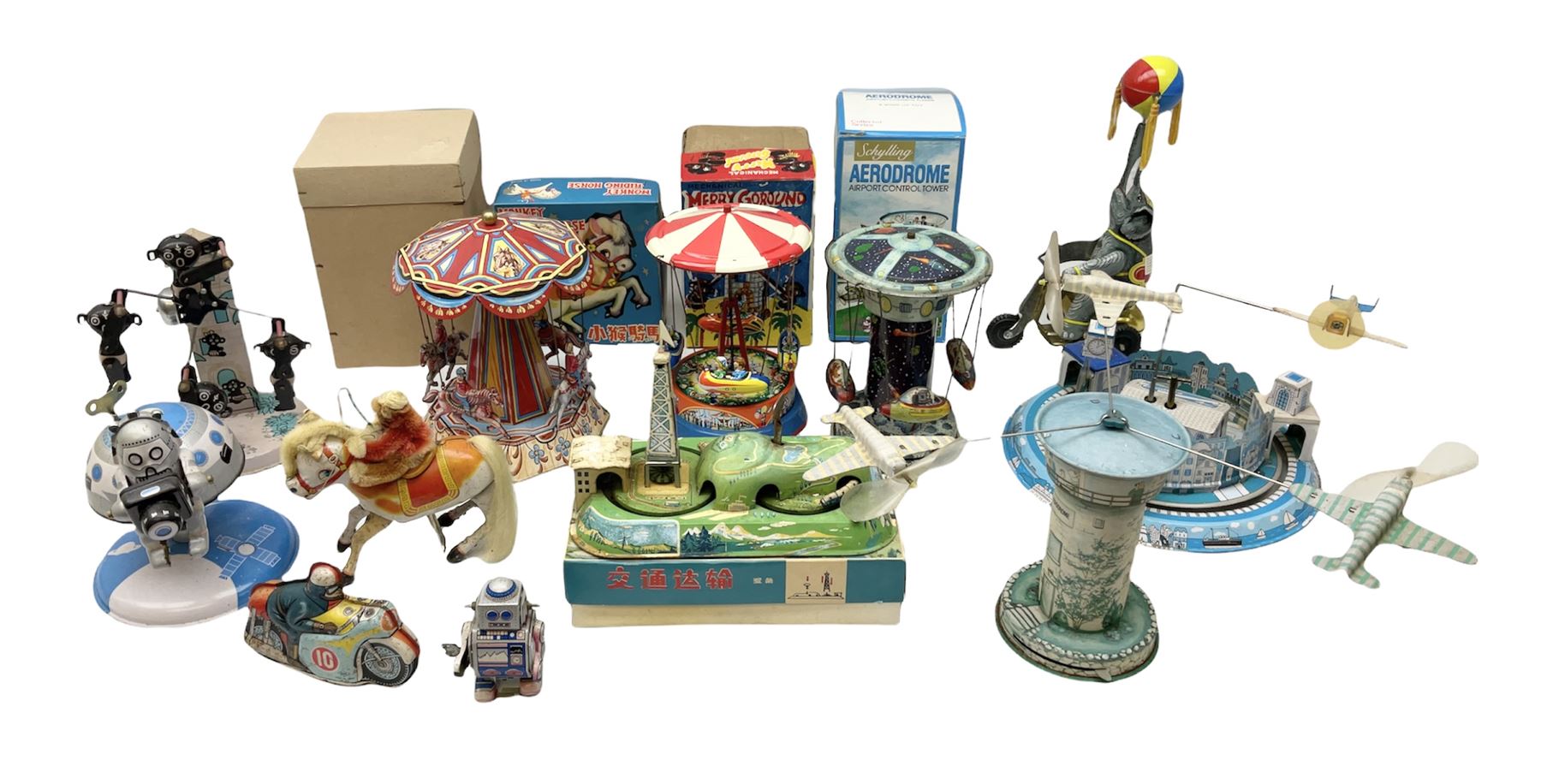 Mid 20th century and later tin plate clockwork toys