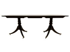 Regency style cross banded mahogany twin pedestal dining table