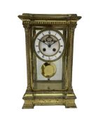 Late 19th century French brass four glass mantle clock by Samuel Marti of Paris