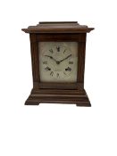 An American Mantle clock in a mahogany case with an eight-day “Ansonia” striking movement