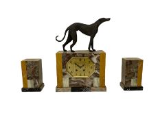 A 20th century French Art Deco clock garniture with a movement by Pierre Megin of Seloncourt