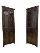 Pair of Old Charm oak corner display cabinets