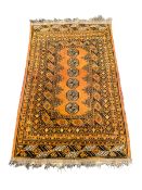 Small Bokhara rust ground rug