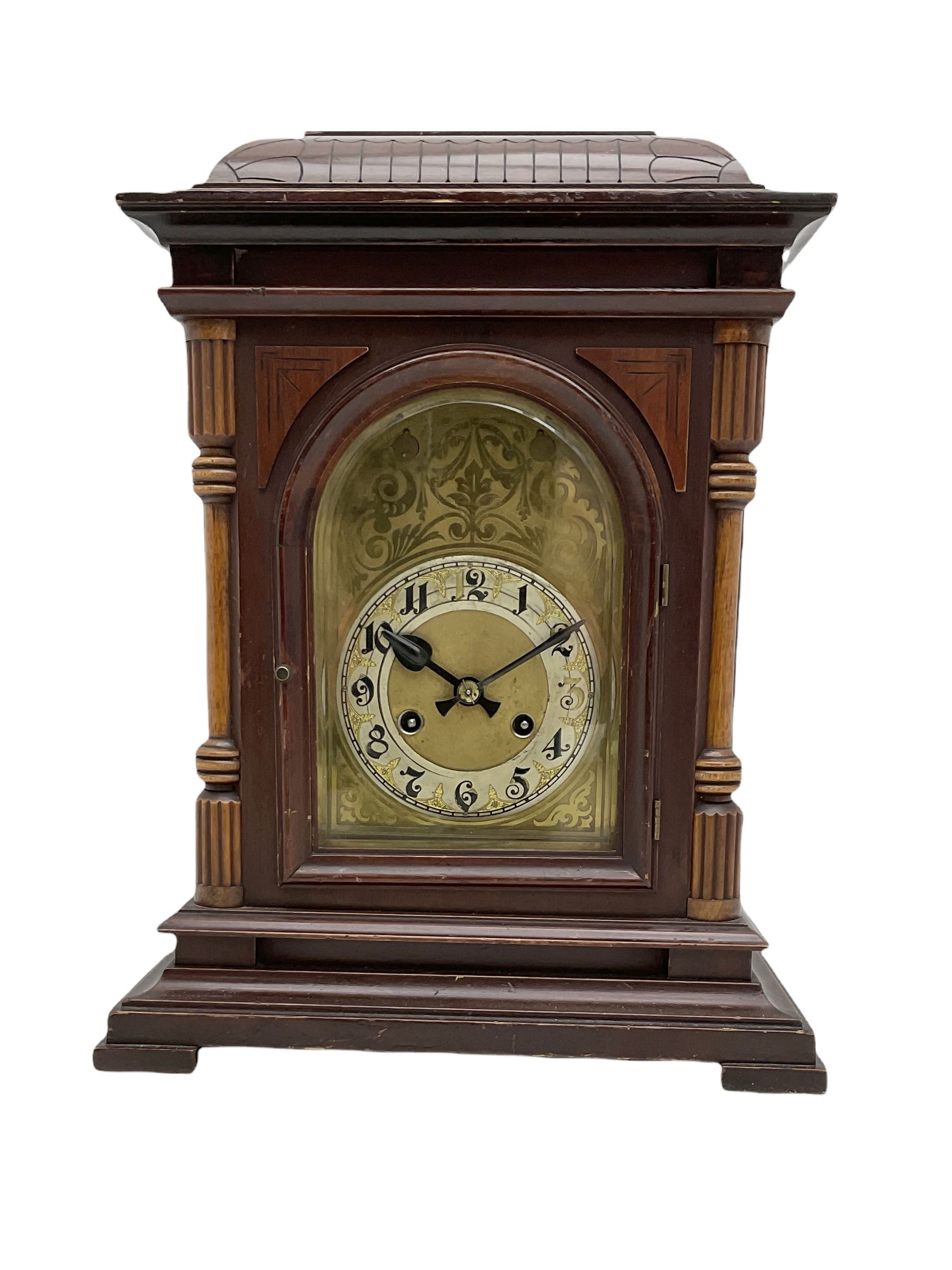 A Junghans two train mantle clock with a subsidiary third chiming train