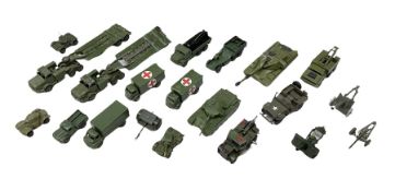 Twenty unboxed and playworn die-cast military vehicles predominantly by Dinky including tank transpo