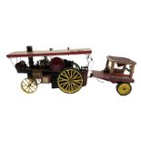 Scratch-built red and yellow painted live-steam scale model of a Showman's Traction Engine