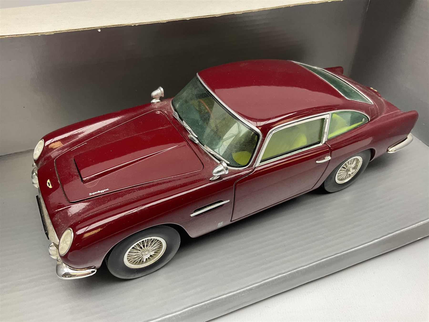 Chrono - two 1:18 scale die-cast models comprising Aston Martin DB5 1963 in 'Peony Red' and Triumph - Image 2 of 9