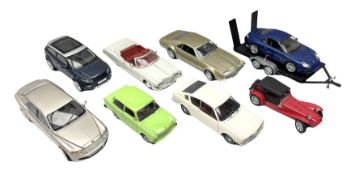 Nine 1:18 scale die-cast models including Anson Audi 100 Coupe S and Cadillac Eldorado 1973; Motor M
