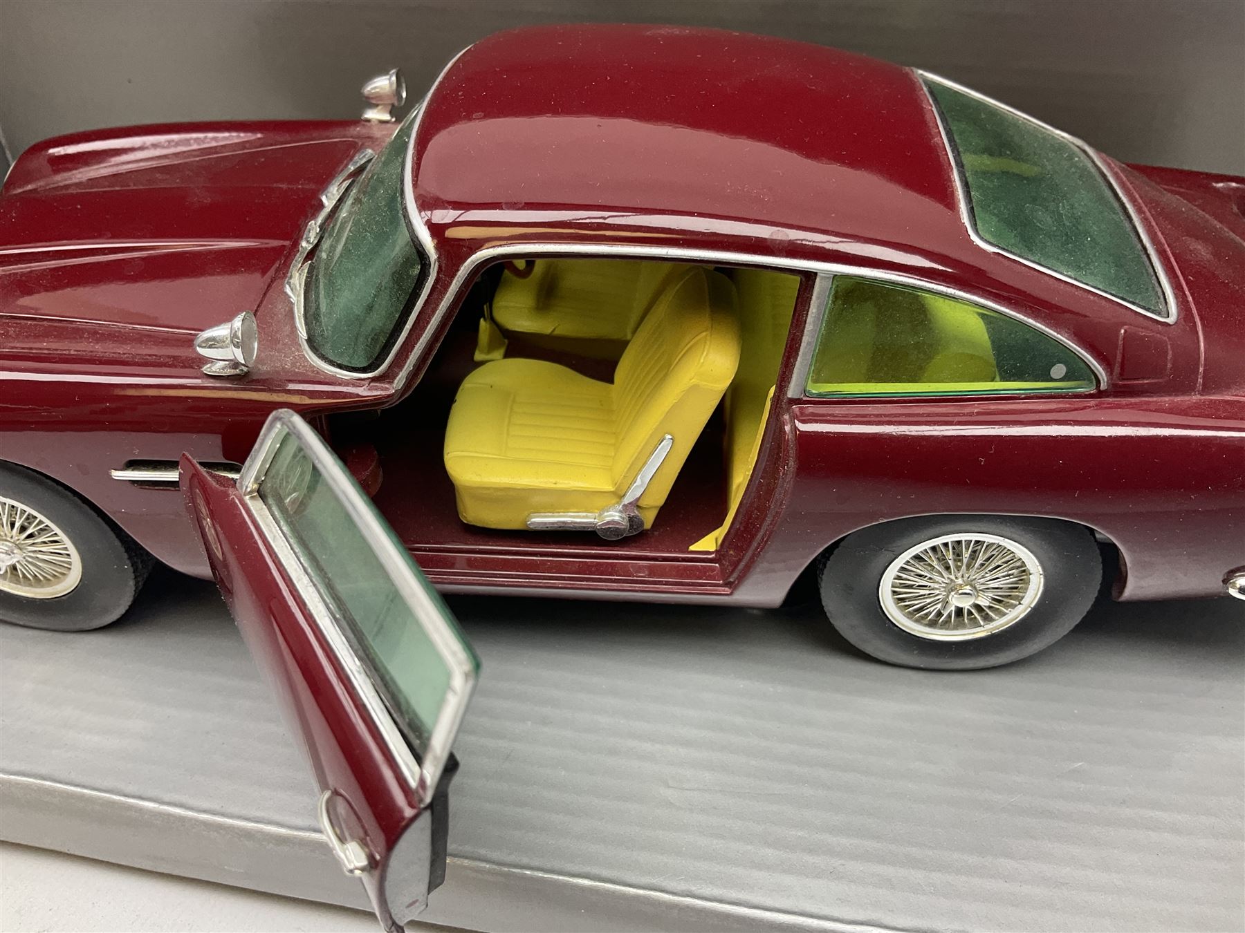 Chrono - two 1:18 scale die-cast models comprising Aston Martin DB5 1963 in 'Peony Red' and Triumph - Image 3 of 9