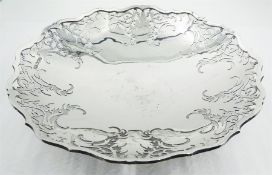 1960's silver comport of circular form with shaped rim and scrolling foliate pierced sides