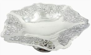 1930's silver tazza of hexagonal form with shaped rim and scrolling foliate pierced sides