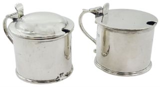 Two early 20th century silver mustard pot and covers