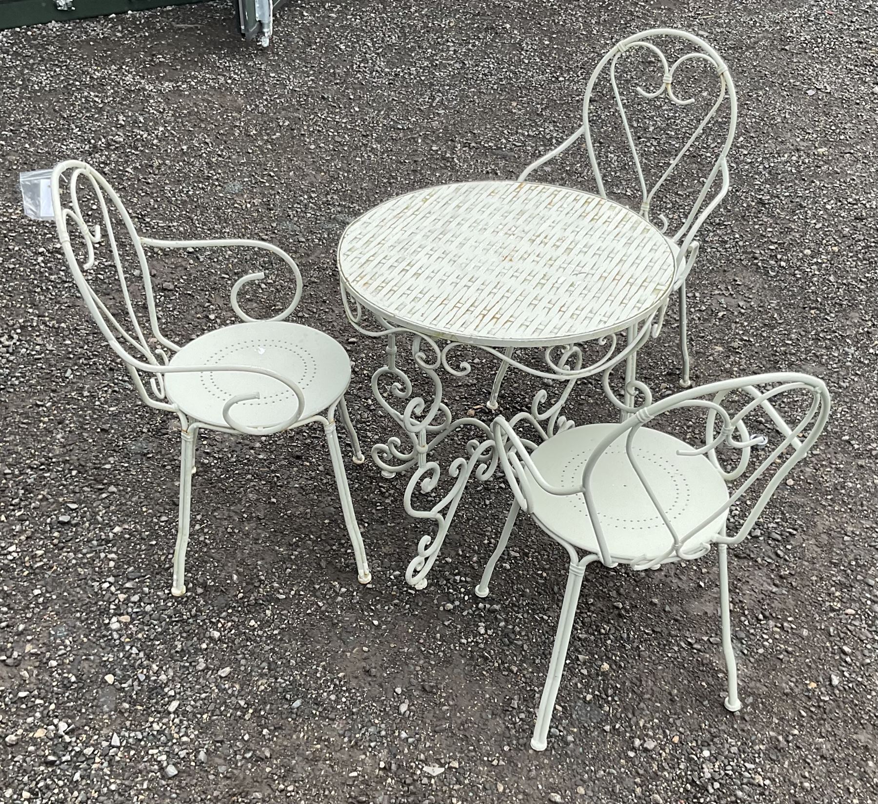 Painted garden table and three chairs - THIS LOT IS TO BE COLLECTED BY APPOINTMENT FROM DUGGLEBY STO