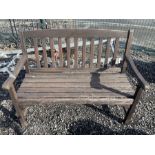 Stained wood garden bench - THIS LOT IS TO BE COLLECTED BY APPOINTMENT FROM DUGGLEBY STORAGE