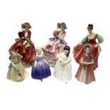 Seven Royal Doulton figures comprising two 'Top O' the Hill'