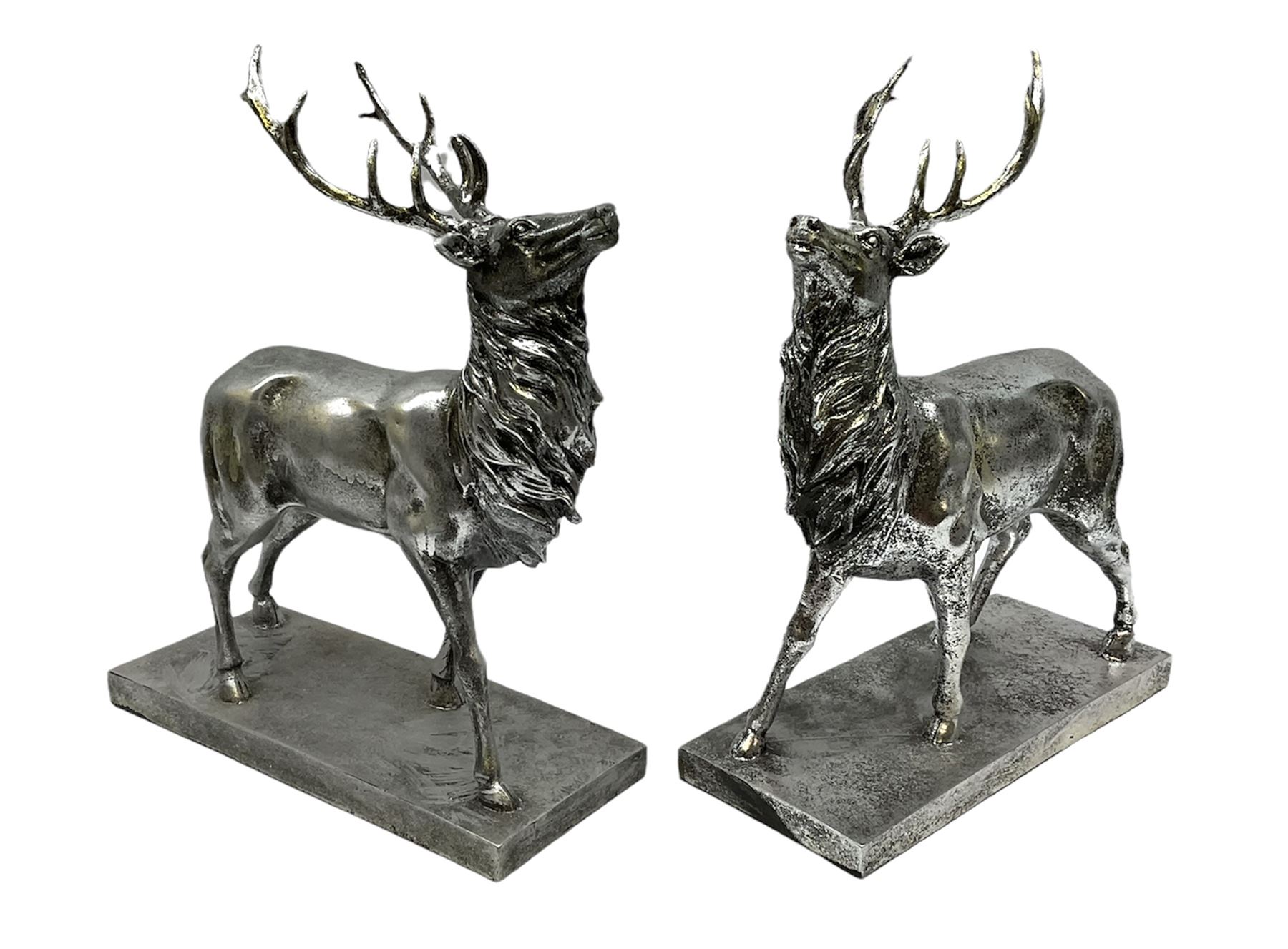 Pair of Composite silvered stags