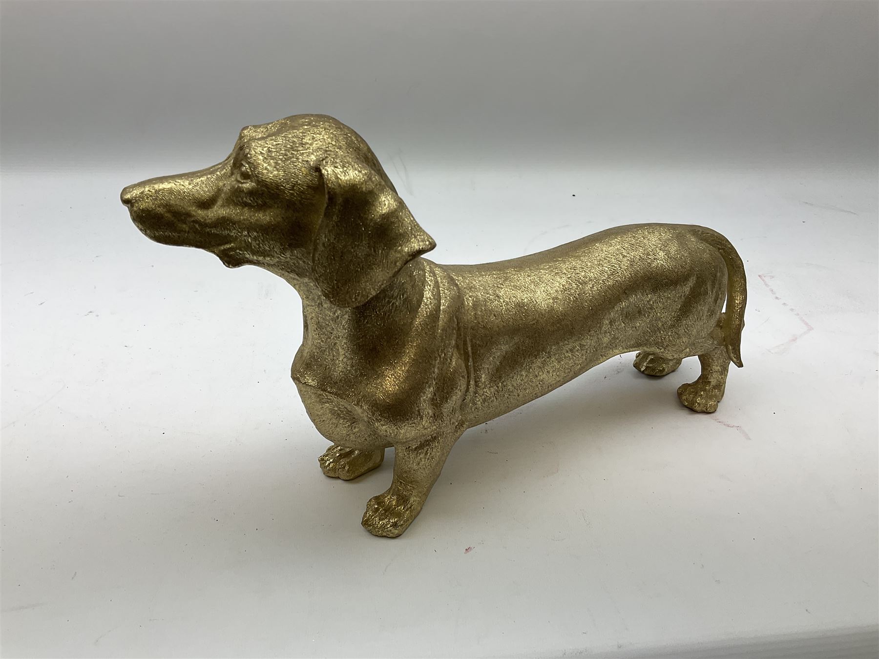Composite metallic gold model of a Dachshund - Image 2 of 2