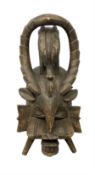 Carved African spirit mask