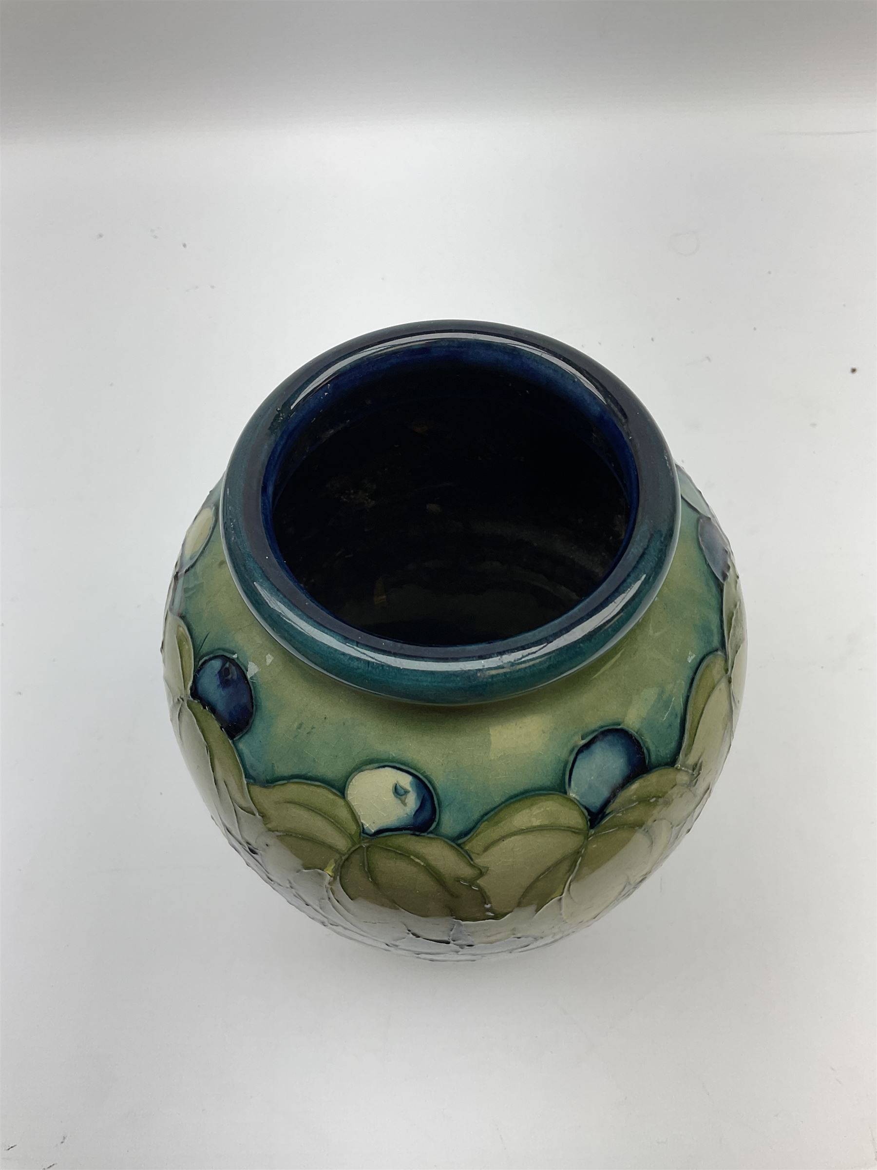 Moorcroft Grape and Leaf pattern baluster vase on green and blue ground - Image 2 of 4