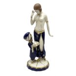Royal Dux Art Deco figure group of Turkish dancing girl with a young boy beside her holding a casket