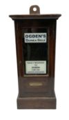Mahogany Ogden's glazed cigarette dispenser wall cabinet