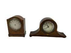 An Edwardian mantle clock in mahogany with stringing and inlay