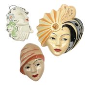 Three Art Deco wall masks