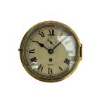 A 20th century English brass cased bulkhead clock with a 6" painted dial