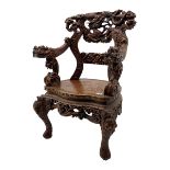Chinese heavily carved hardwood armchair