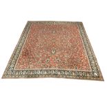 Persian design red ground carpet